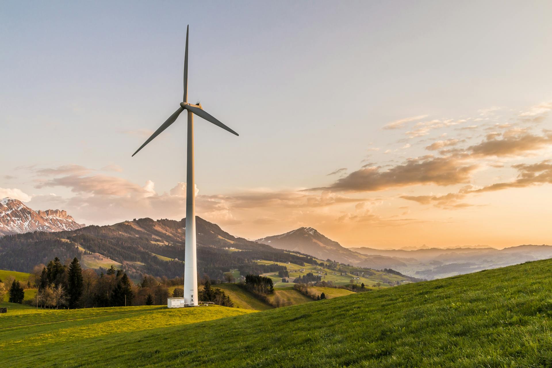 Wind turbines on a Dutch polder at sunset